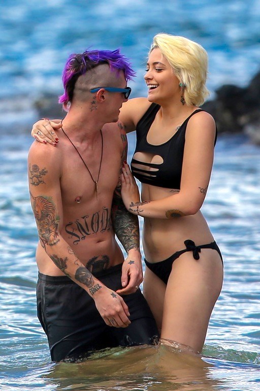 Paris Jackson snapped getting cuddly on the beach with her BF